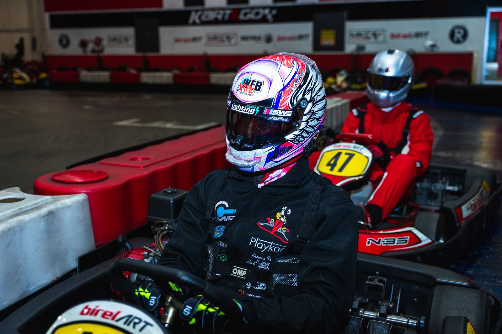 Celebrazione podio team PRIME Racing dopo vittoria karting